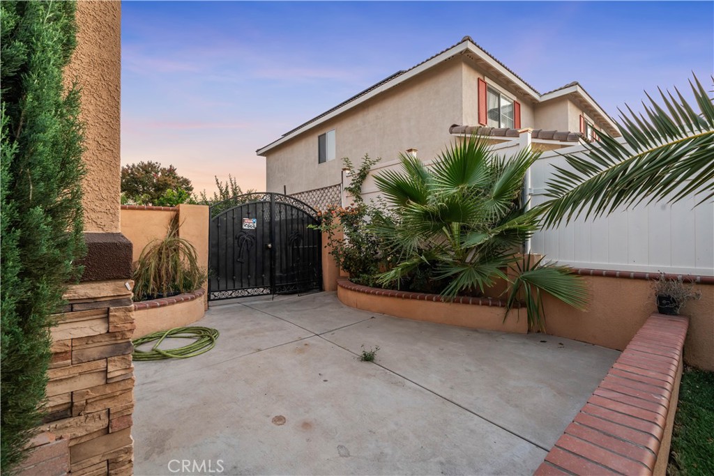 3807 Seattle Street Hemet, CA 92545 - Photo 36 of 38 a view of a house with a patio