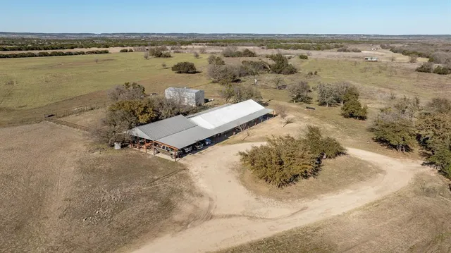 an aerial view of beach and ocean