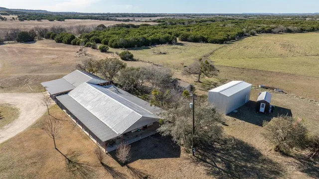 a view of an ocean with a mountain