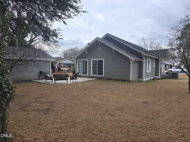 a house view with a garden space