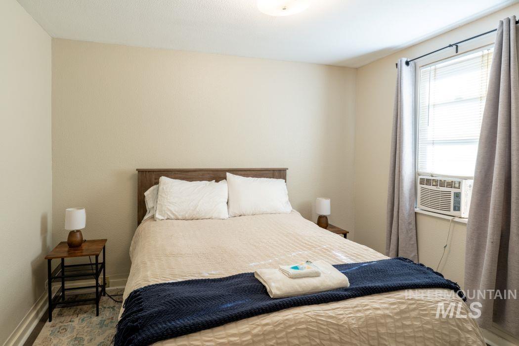 112 South Asbury Street Moscow, ID 83843 - Photo 10 of 26 Bedroom with baseboards and cooling unit