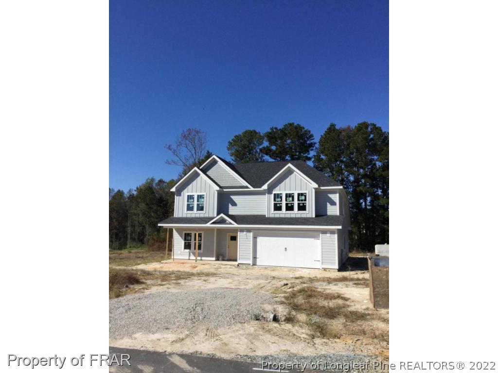 508 Abbey Road Carthage, NC 28327 - Photo 1 of 34 a view of a house with a yard
