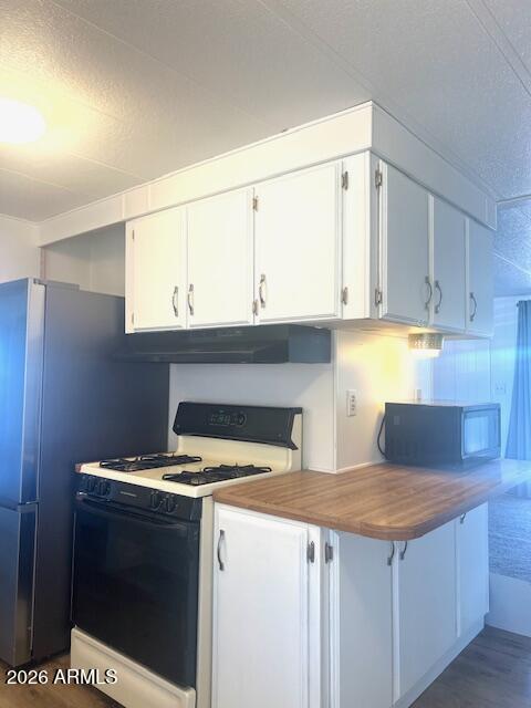 2605 South Tomahawk Road, Unit 187 Apache Junction, AZ 85119 - Photo 8 of 34 Many cabinets and breakfast bar