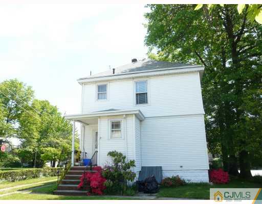 467 Crows Mill Road Fords, NJ 08863 - Photo 2 of 9 a front view of a house with a yard