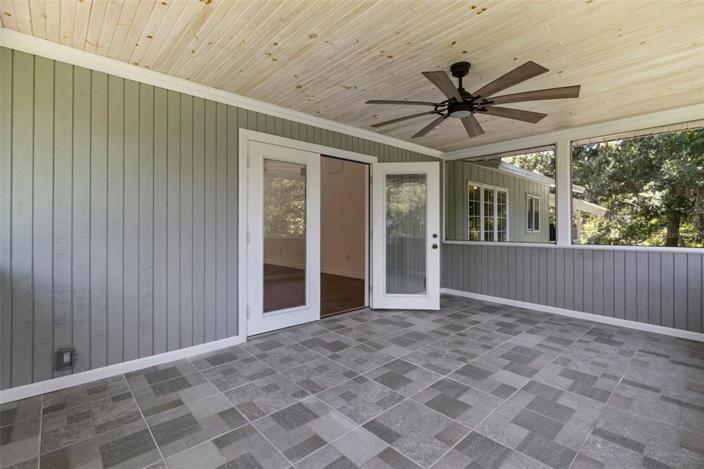 1183 Northwest Girl Scout Road Arcadia, FL 34266 - Photo 21 of 43 a view of a porch with a table and chairs