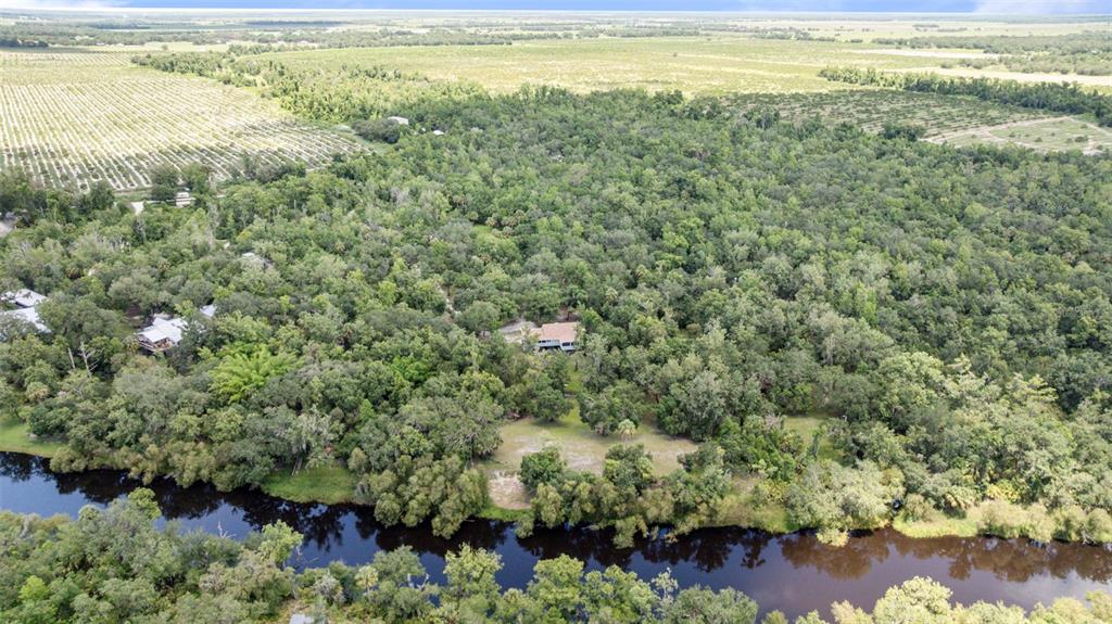 1183 Northwest Girl Scout Road Arcadia, FL 34266 - Photo 37 of 43 a view of an outdoor space and a lake view