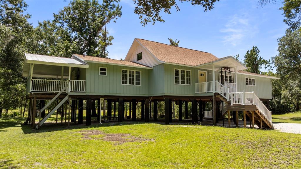 1183 Northwest Girl Scout Road Arcadia, FL 34266 - Photo 42 of 43 a view of a house with pool and sitting area