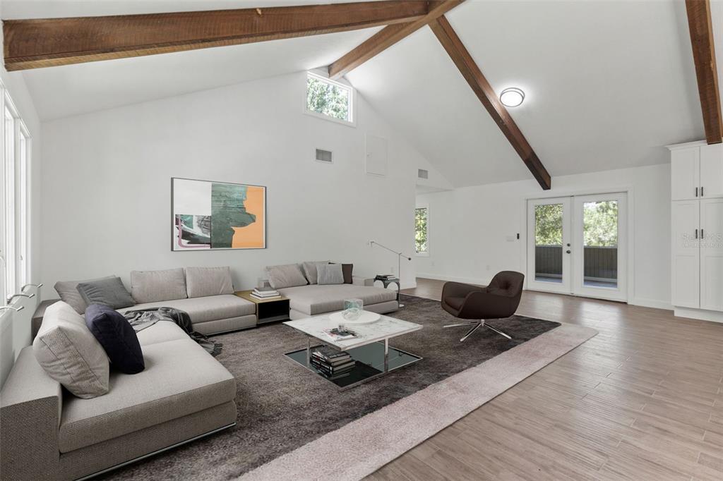 1183 Northwest Girl Scout Road Arcadia, FL 34266 - Photo 9 of 43 a living room with furniture and wooden floor