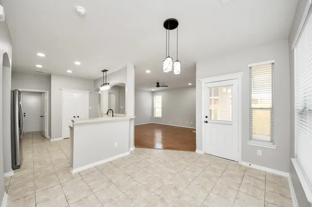 a view of an empty room and window