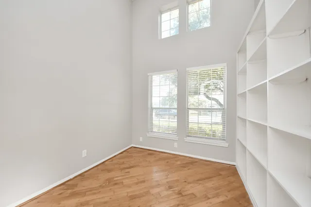 an empty room with windows