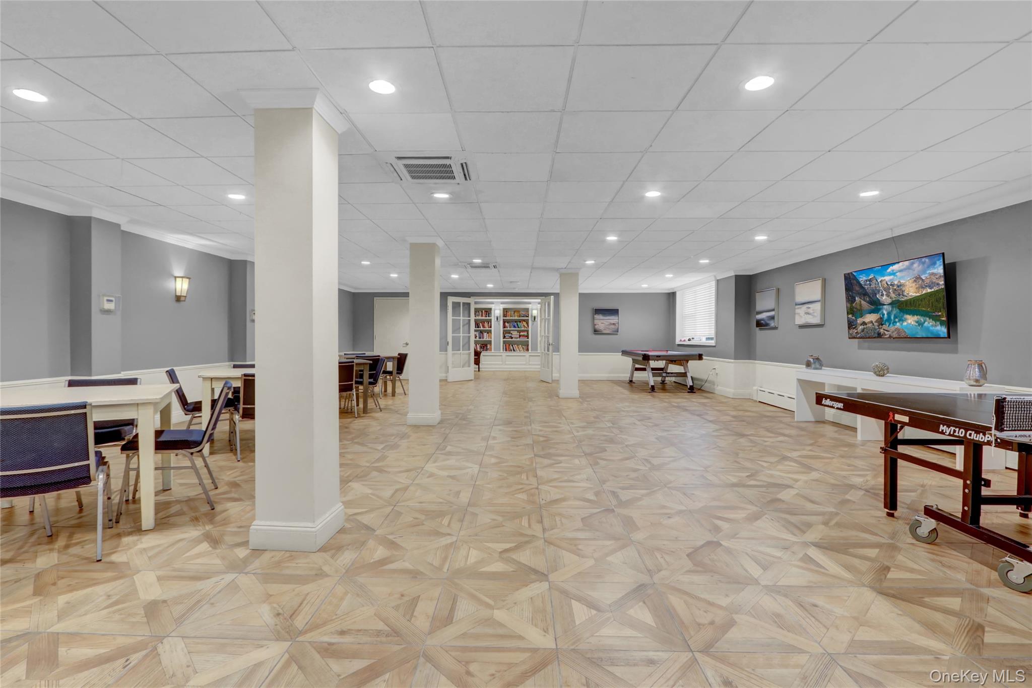 700 Shore Road, Unit 4K Long Beach, NY 11561 - Photo 20 of 32 Air Conditioned Recreation / Party area with recessed lighting and a drop ceiling