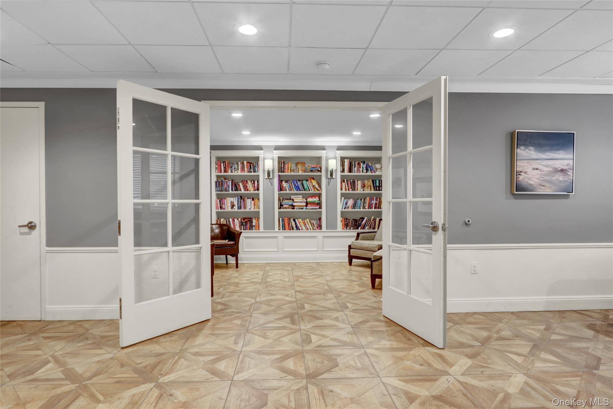 700 Shore Road, Unit 4K Long Beach, NY 11561 - Photo 22 of 32 Library In Air Conditioned Recreation / Party Room.