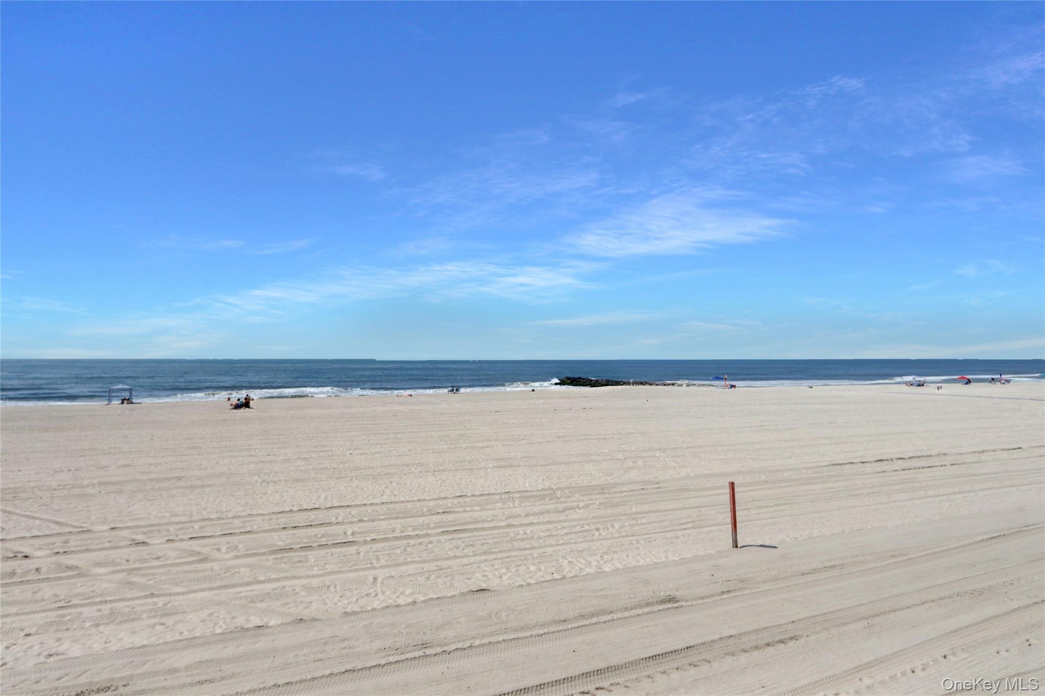 700 Shore Road, Unit 4K Long Beach, NY 11561 - Photo 29 of 32 Water view featuring nearby beach