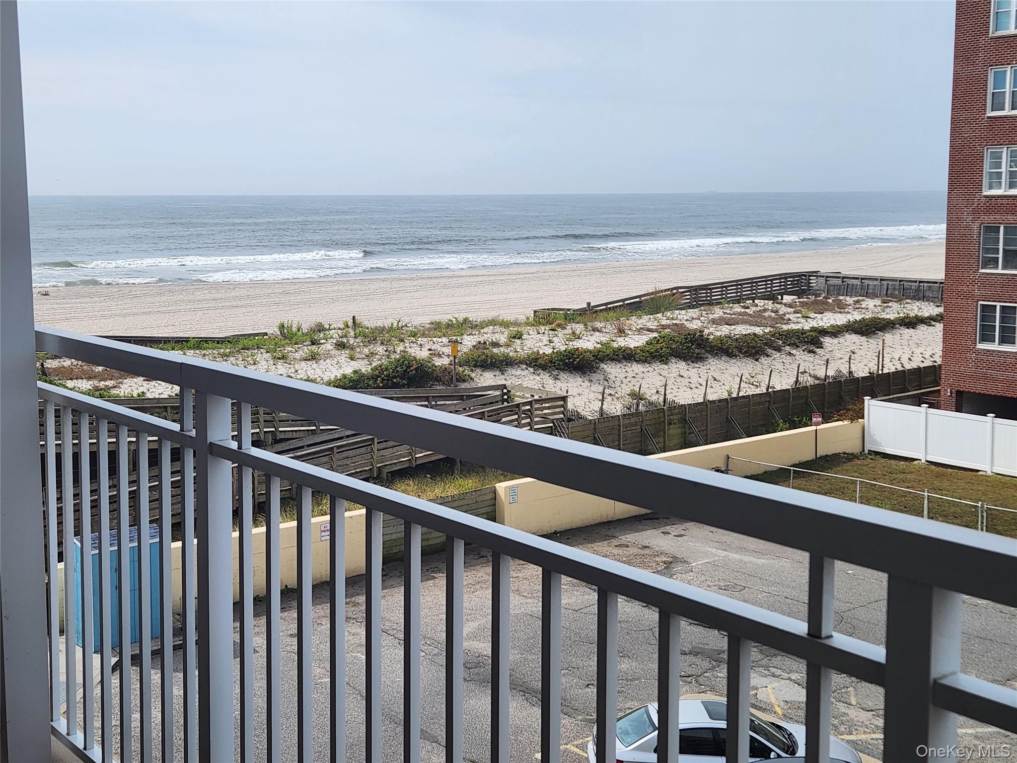 700 Shore Road, Unit 4K Long Beach, NY 11561 - Photo 3 of 32 Water view with beach/ Ocean From Terrace. Out Let For Electric Barbecue.