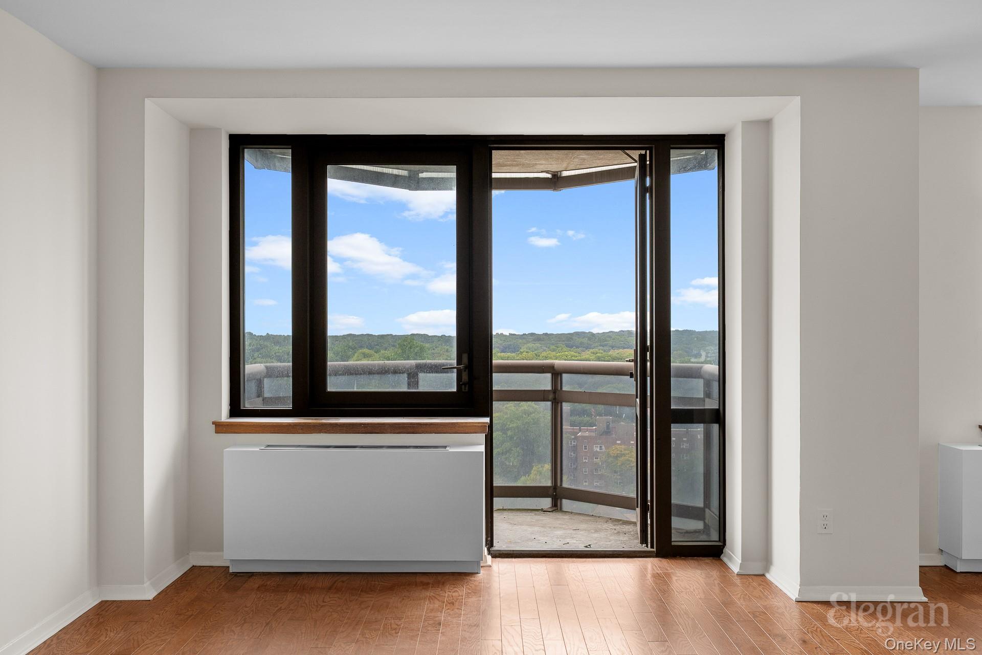 11201 Queens Boulevard, Unit 16F Queens, NY 11375 - Photo 13 of 24 a view of a room that has a large window