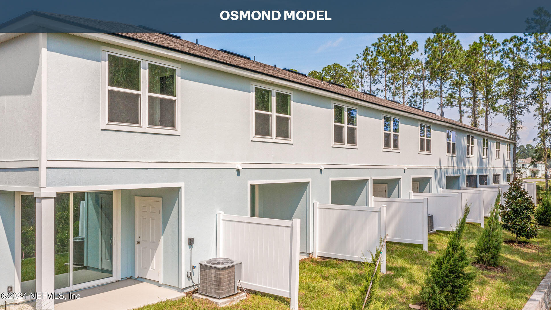 79 Crisanto Road St. Augustine, FL 32084 - Photo 38 of 53 a front view of a house with a garden