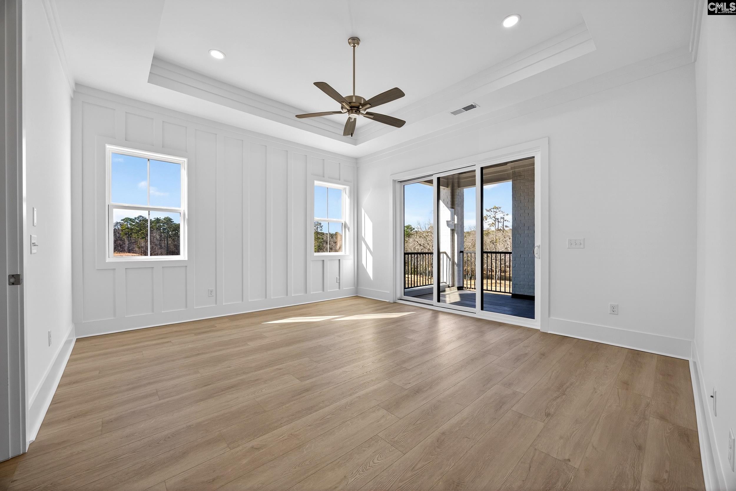 1318 Long Grove Way Lexington, SC 29072 - Photo 47 of 90 a view of an empty room with a window and wooden floor