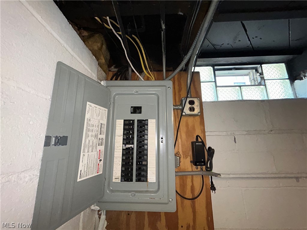 9316 Alexander Road Garfield Heights, OH 44125 - Photo 22 of 27 Electrical panel with circuit breakers