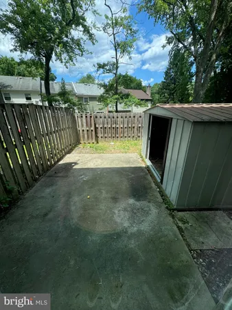 a view of backyard with outdoor space