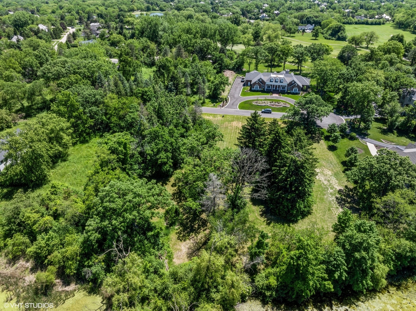 1146 Steeple View Drive Long Grove, IL 60047 - Photo 9 of 14 an aerial view of a house with a yard