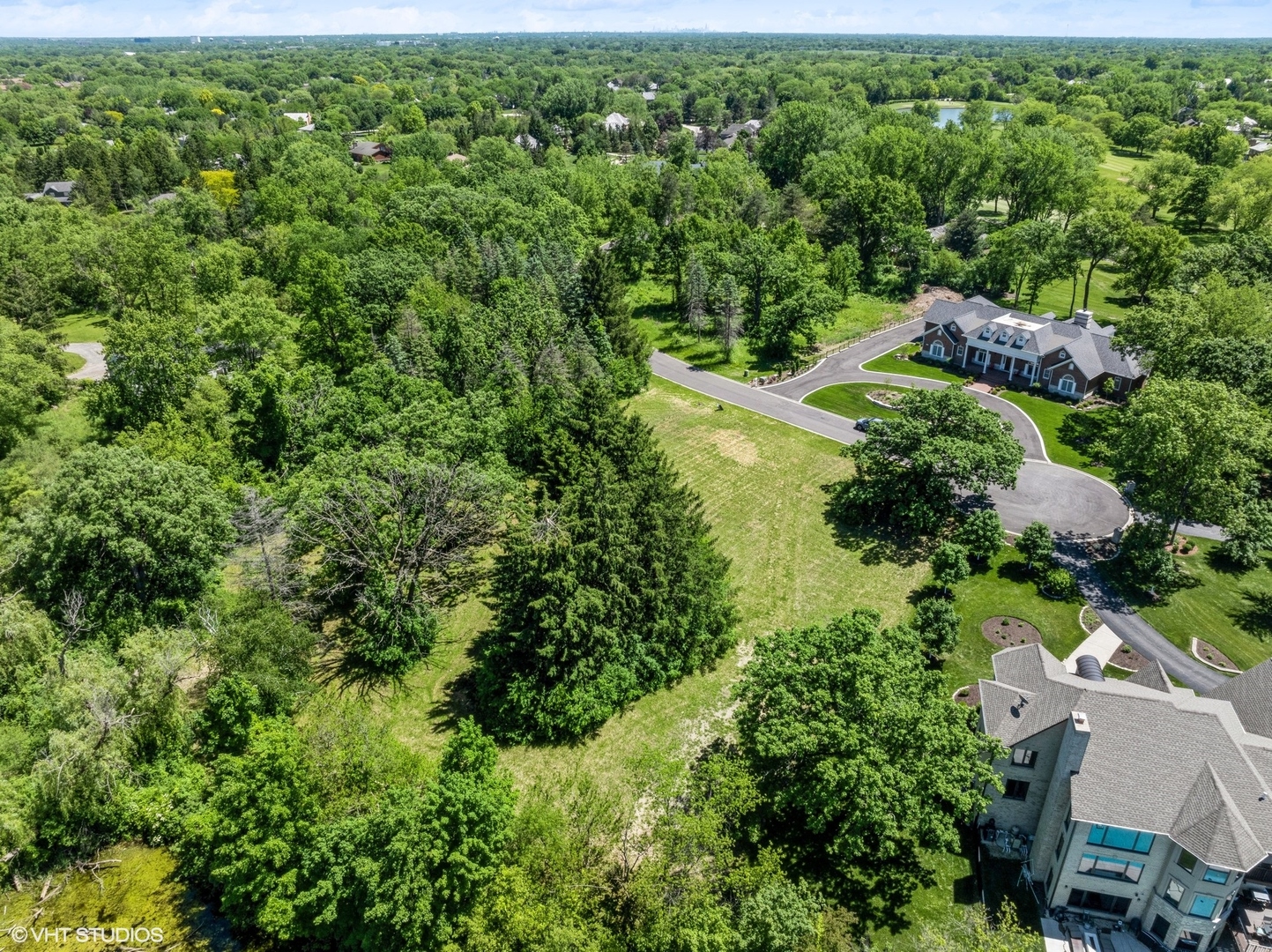 1146 Steeple View Drive Long Grove, IL 60047 - Photo 10 of 14 an aerial view of residential house with outdoor space and trees all around
