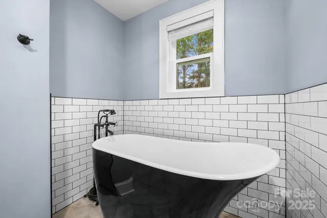 a kitchen with a sink and a window