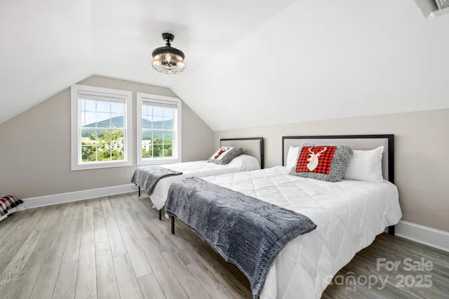 a bathroom with a sink mirror and toilet