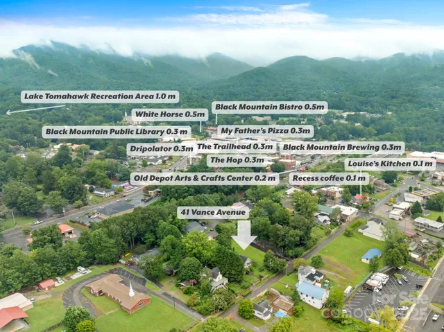 a patio with table and chairs