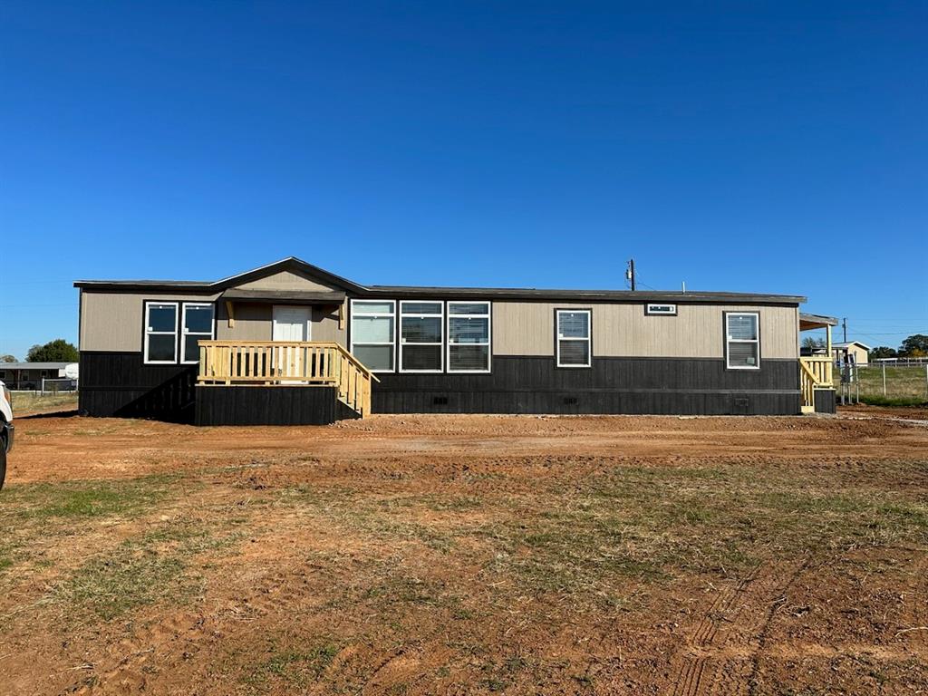 a house view with a garden space