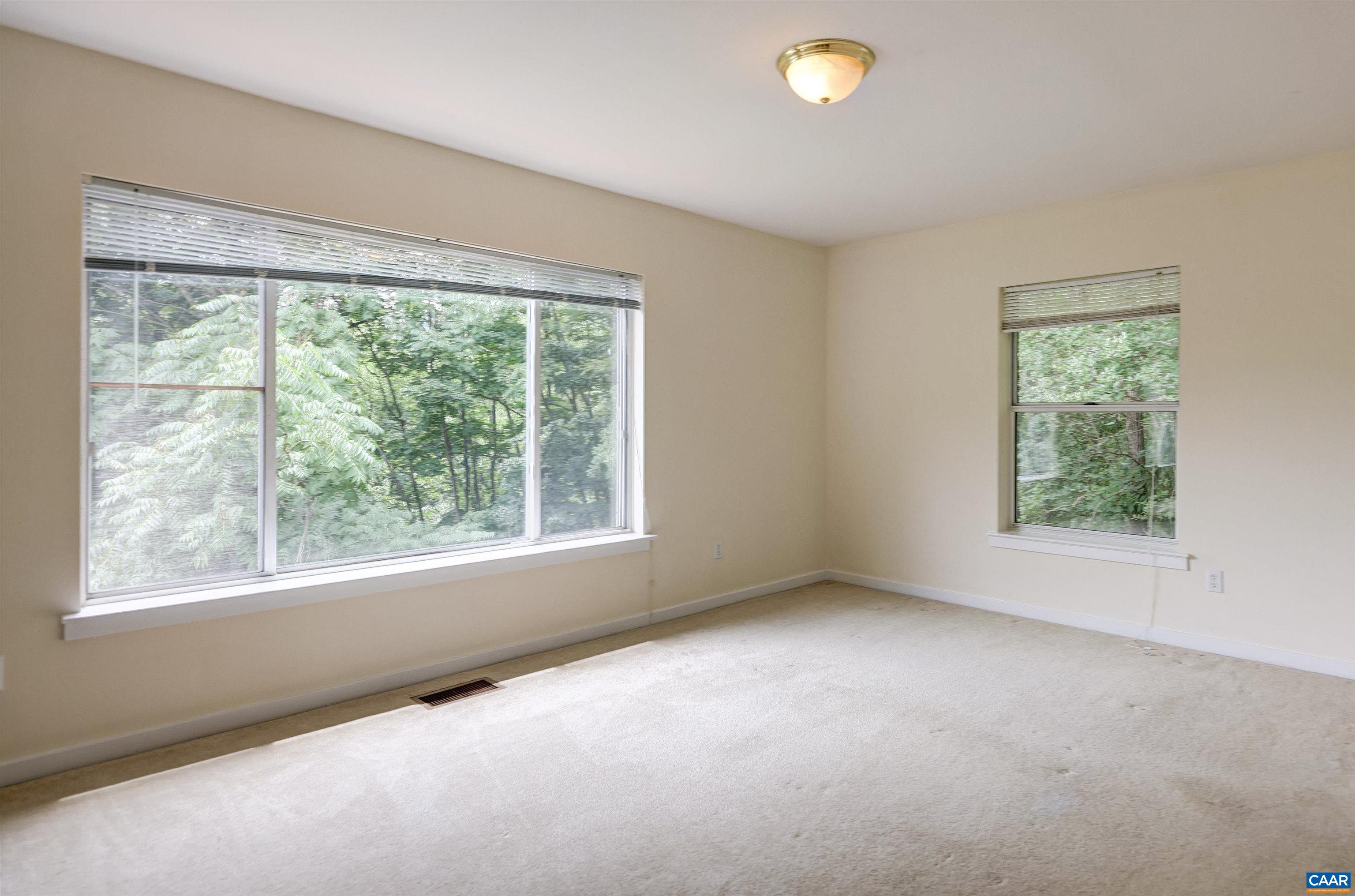1296 Maple View Drive Charlottesville, VA 22902 - Photo 15 of 35 an empty room with a window