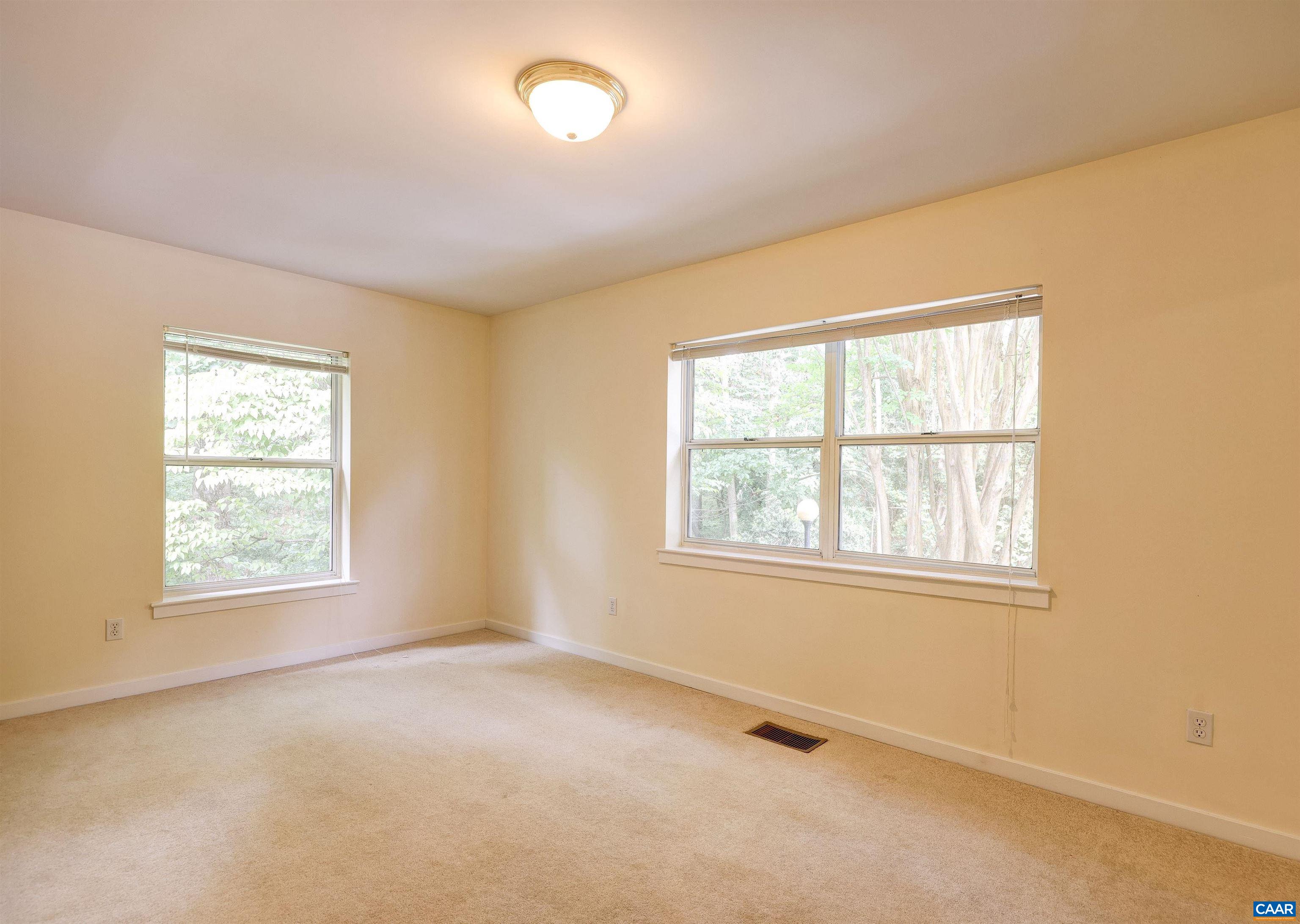 1296 Maple View Drive Charlottesville, VA 22902 - Photo 17 of 35 an empty room with a window
