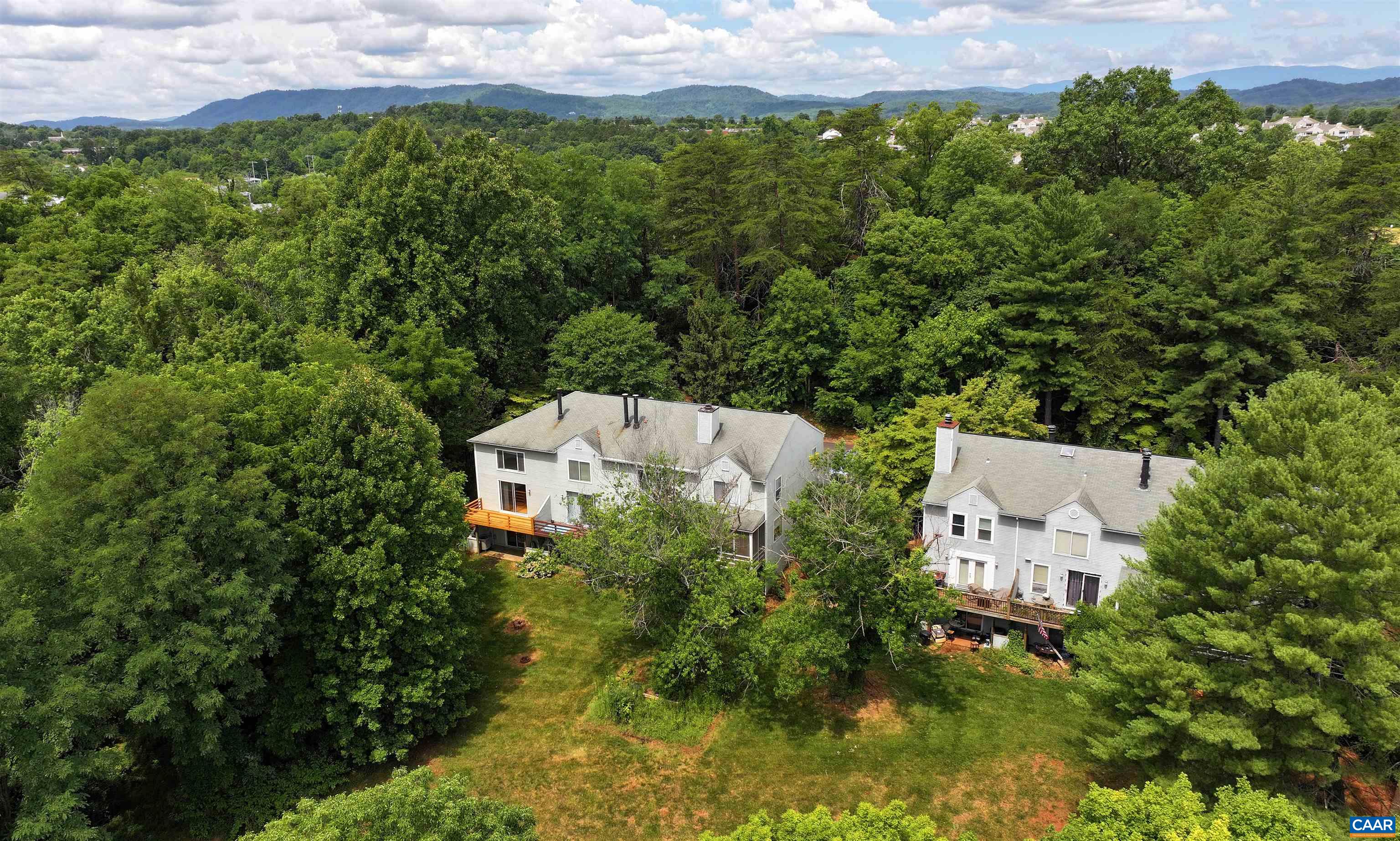 1296 Maple View Drive Charlottesville, VA 22902 - Photo 31 of 35 an aerial view of a house with a yard and lake