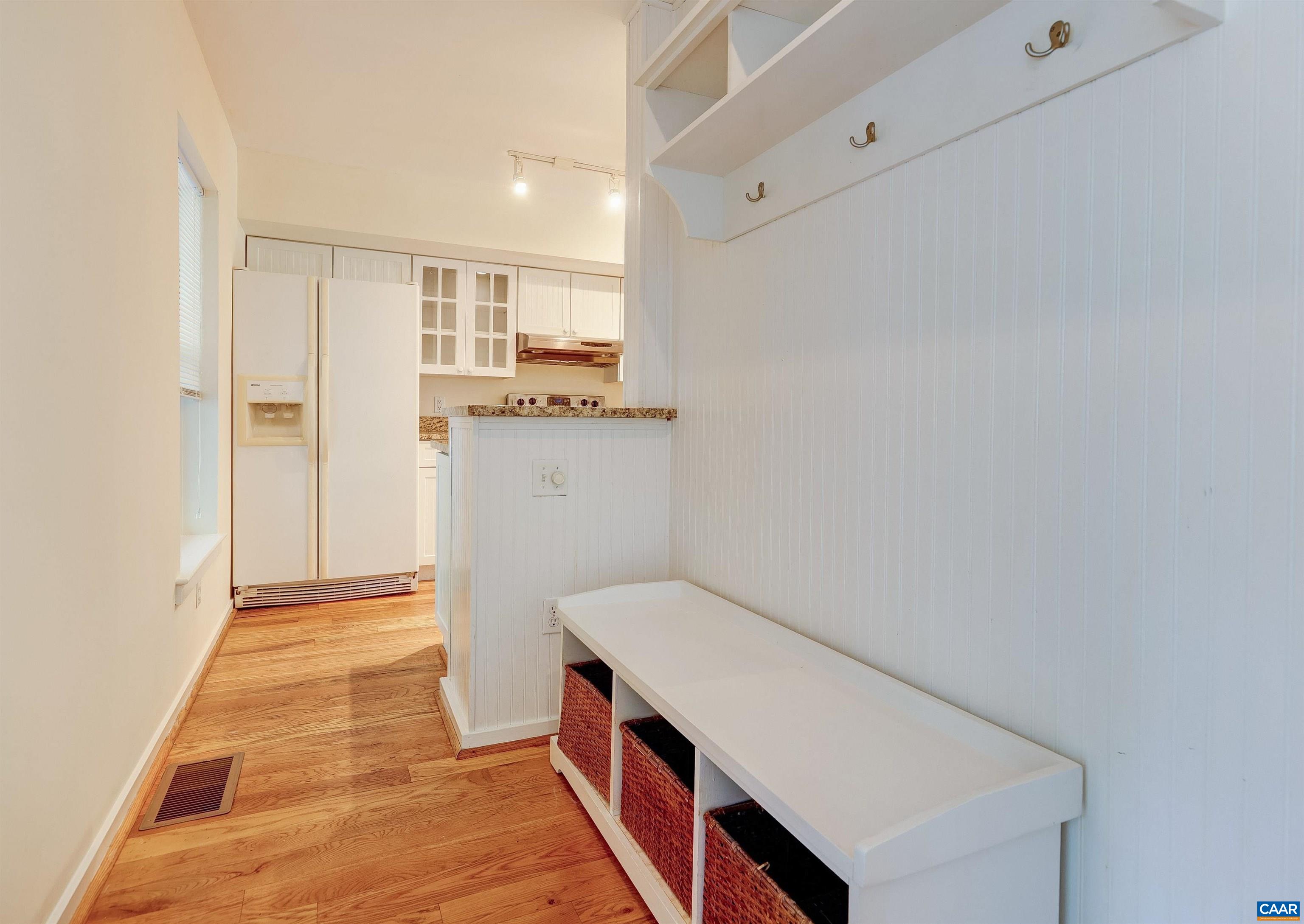 1296 Maple View Drive Charlottesville, VA 22902 - Photo 6 of 35 a view of hallway with wooden floor