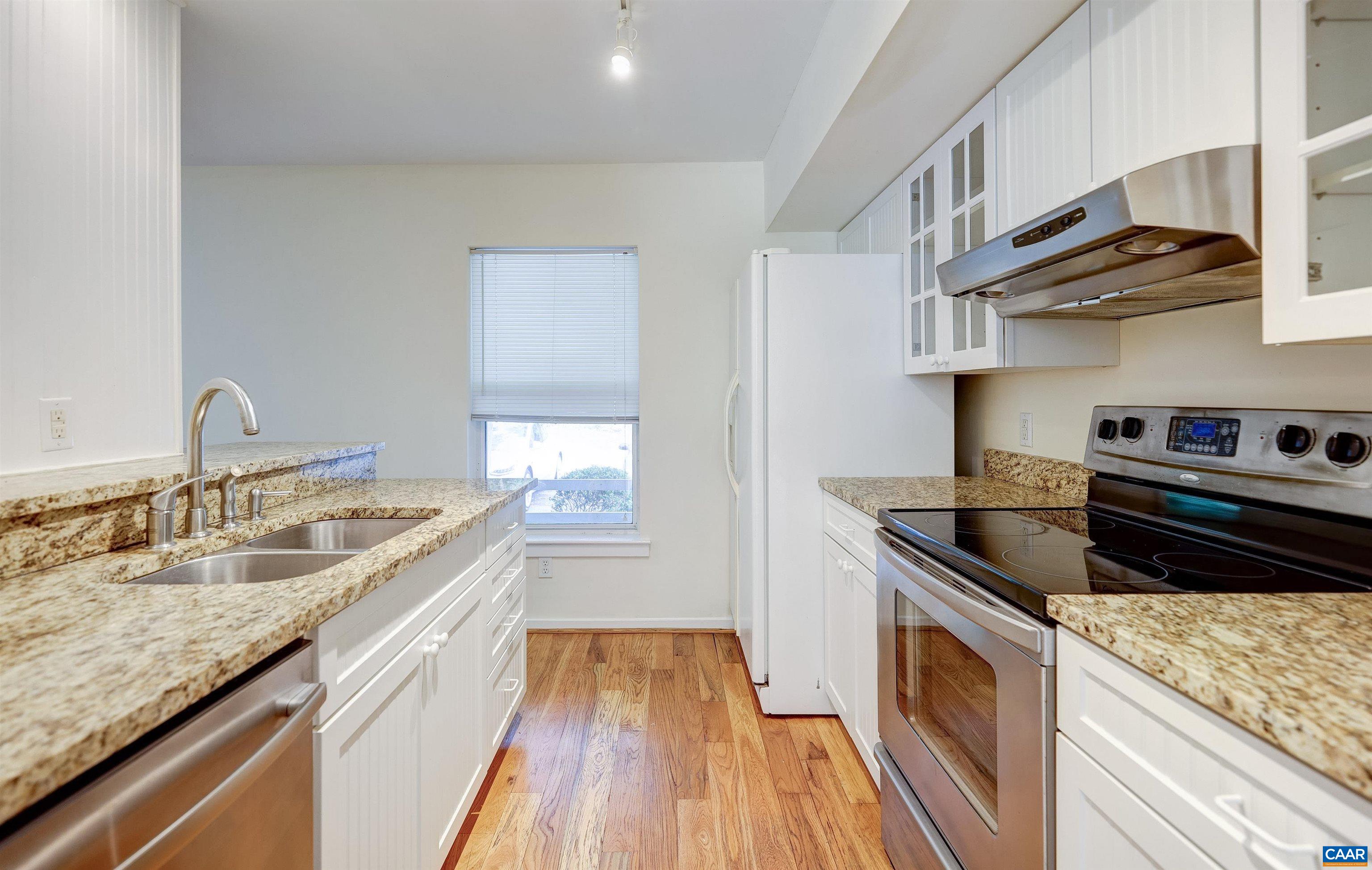1296 Maple View Drive Charlottesville, VA 22902 - Photo 8 of 35 a kitchen that has a sink and a stove