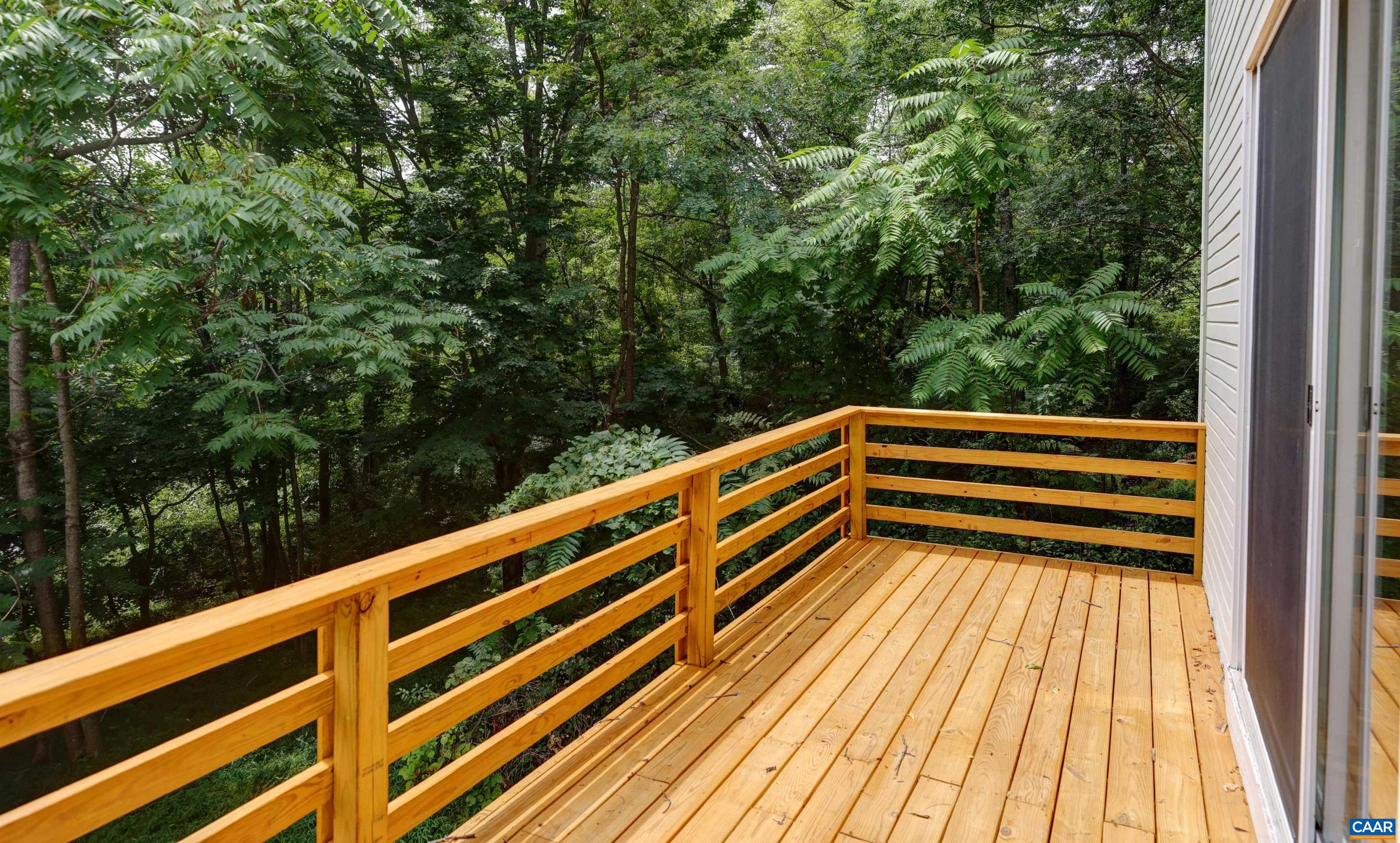 1296 Maple View Drive Charlottesville, VA 22902 - Photo 10 of 35 a view of balcony with wooden floor and fence