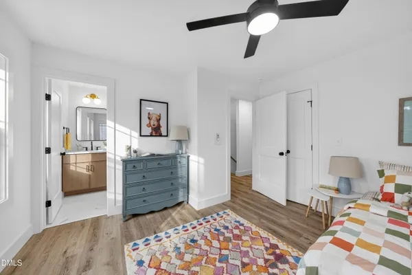 a bedroom with a bed and furniture