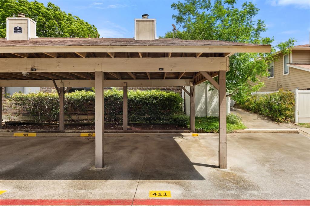 2240 Tarpley Road, Unit 411 Carrollton, TX 75006 - Photo 26 of 28 a view of a house with a yard