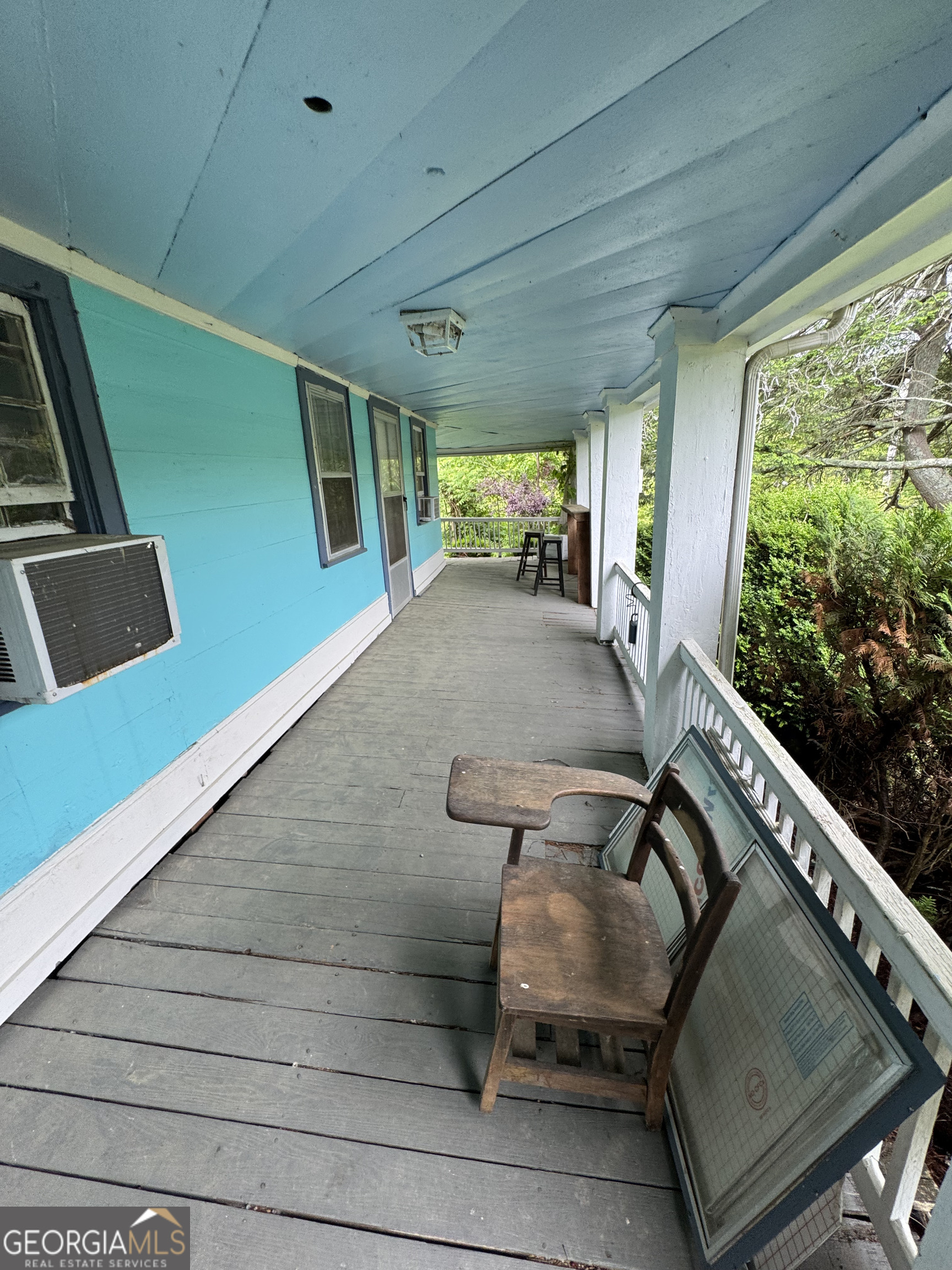 9122 Blue Ridge Highway Blairsville, GA 30512 - Photo 19 of 42 a view of a porch with furniture