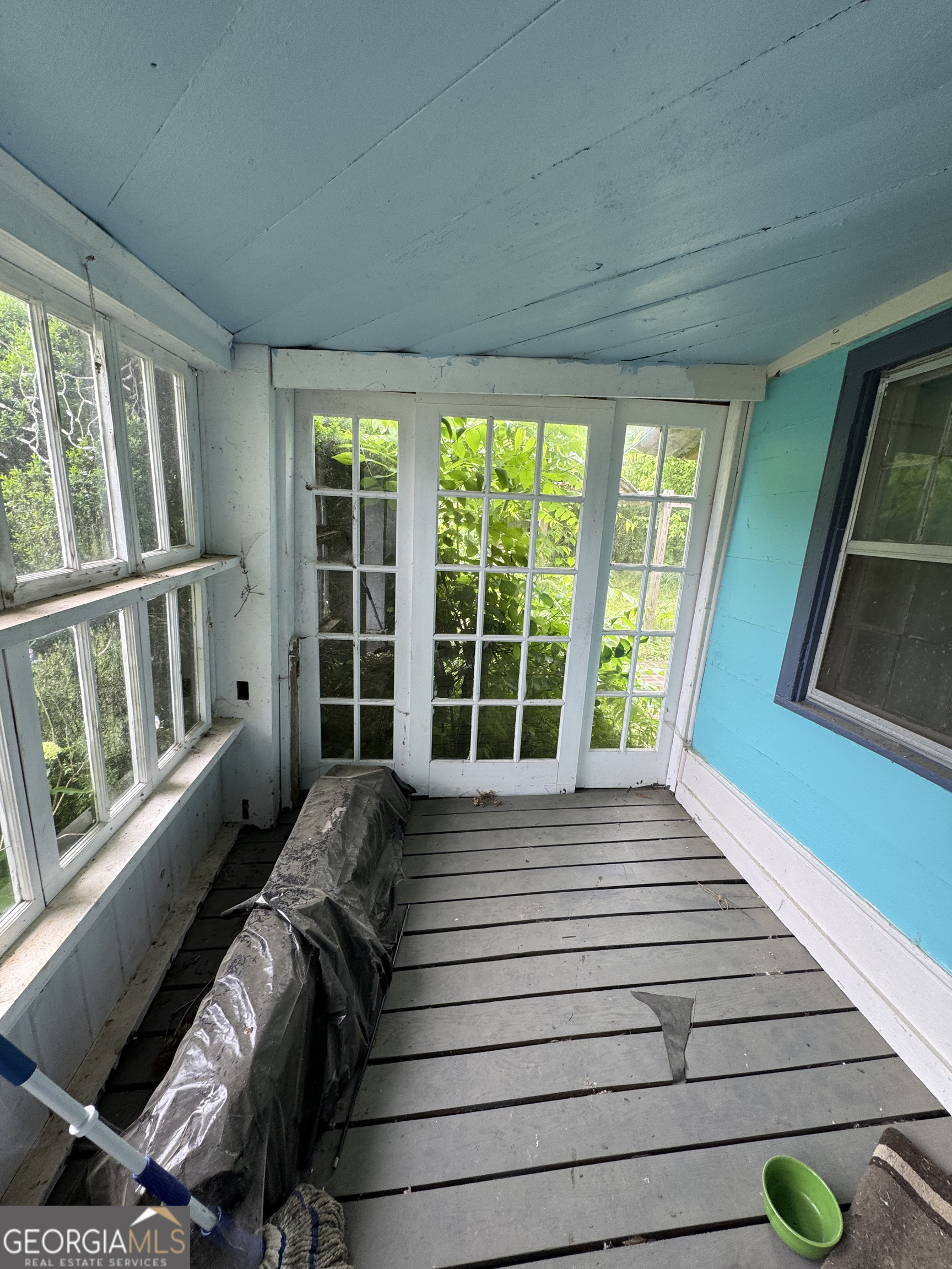 9122 Blue Ridge Highway Blairsville, GA 30512 - Photo 20 of 42 a view of a room with two beds and a large window