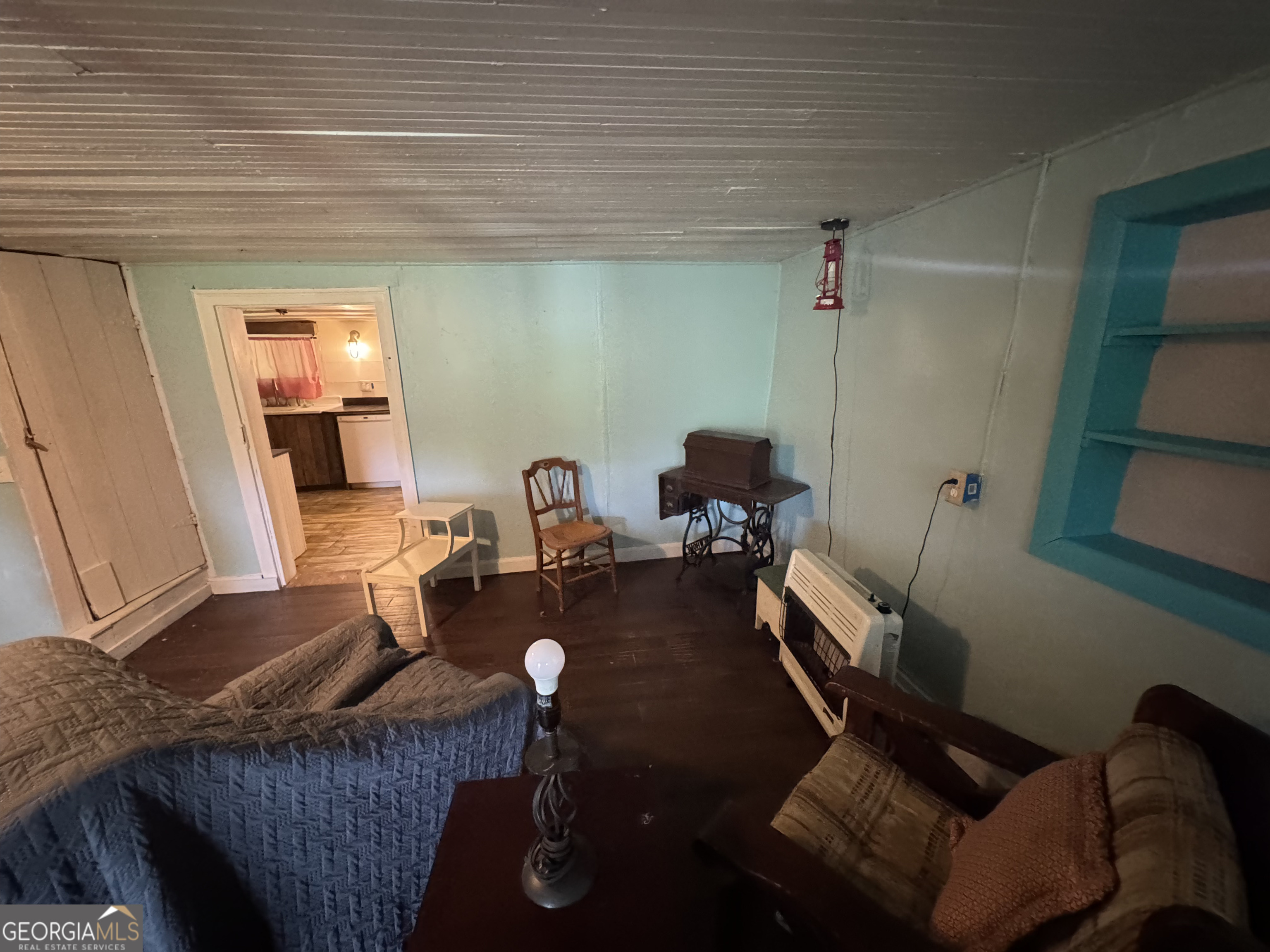 9122 Blue Ridge Highway Blairsville, GA 30512 - Photo 21 of 42 a living room with furniture and wooden floor