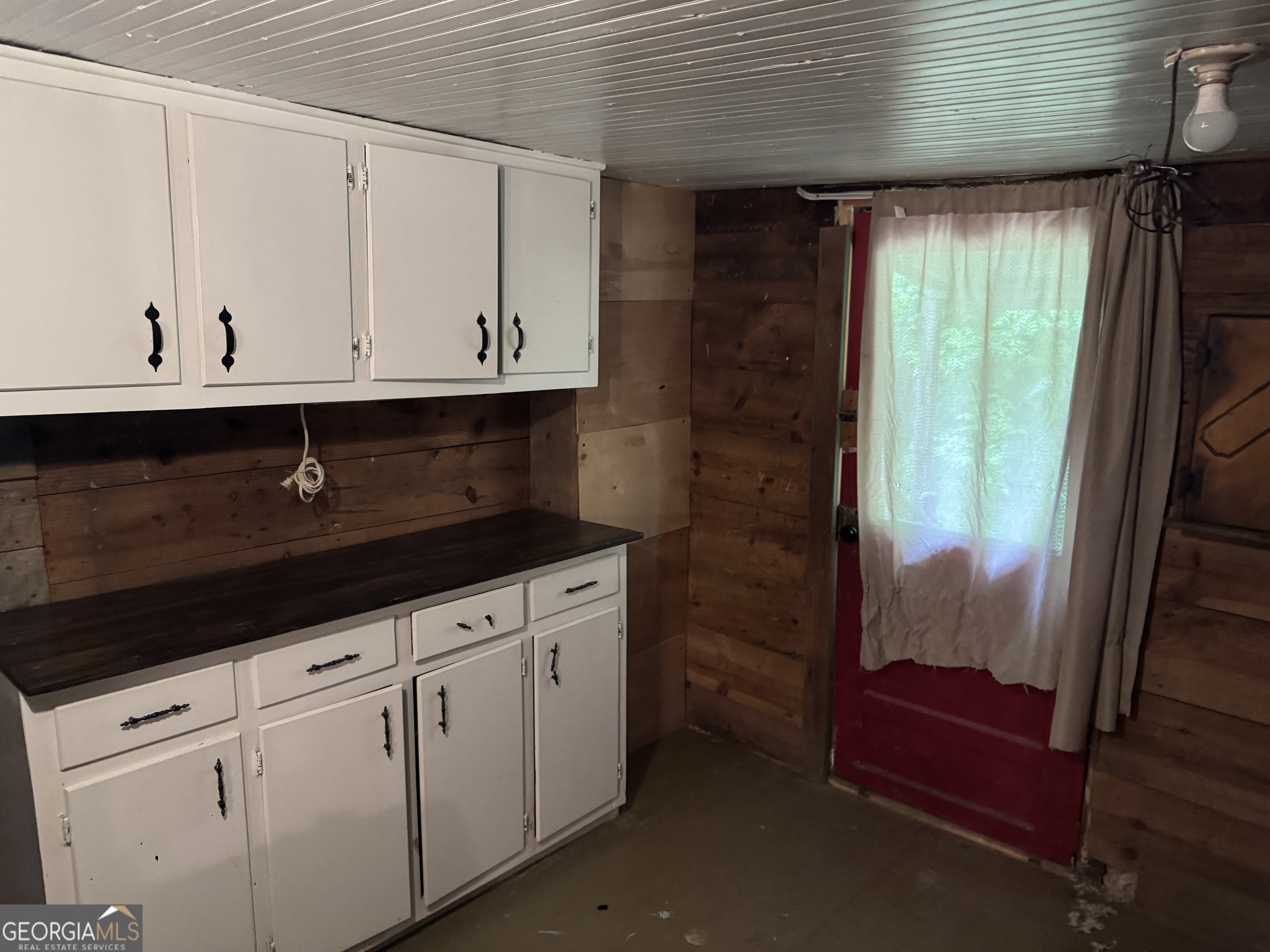 9122 Blue Ridge Highway Blairsville, GA 30512 - Photo 32 of 42 a view of cabinets with wooden floor