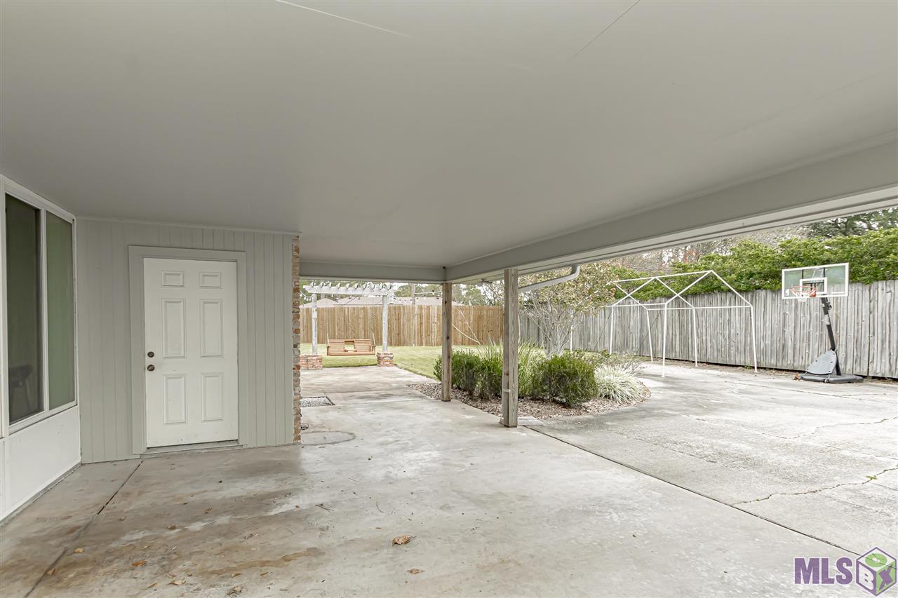 10399 Firelight Avenue Baton Rouge, LA 70815 - Photo 16 of 34 Rear Carport