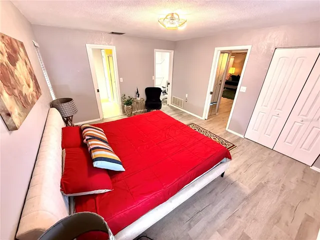 a view of a swimming pool with seating area