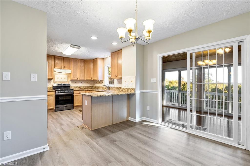 1025 Krishna Road Sandy Ridge, NC 27046 - Photo 12 of 50 Kitchen & Dining Room