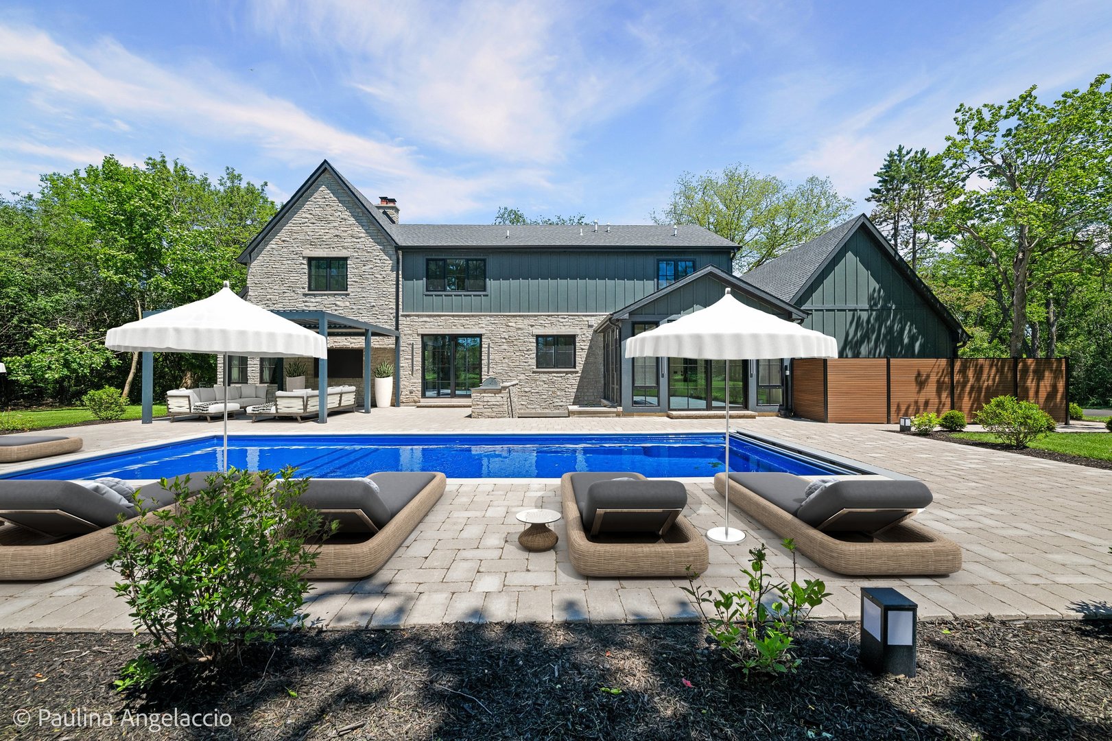 699 Plum Tree Road Barrington Hills, IL 60010 - Photo 2 of 84 a front view of house with swimming pool outdoor seating and barbeque oven