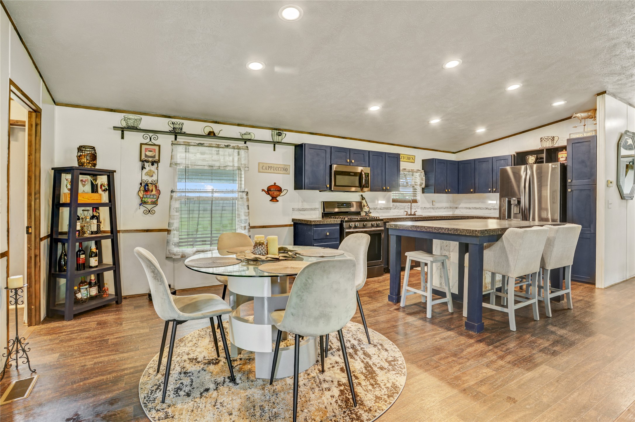 2811 Pisces Street Rosenberg, TX 77469 - Photo 12 of 34 Dining seating beside the island creates plenty of space for seating.