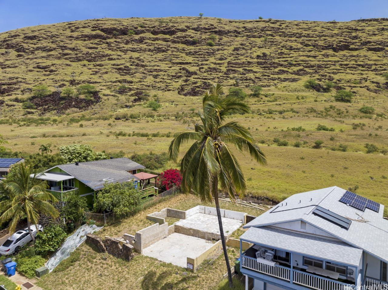 86-896 Iniki Place Waianae, HI 96792 - Photo 8 of 16 a view of a terrace with wooden floor