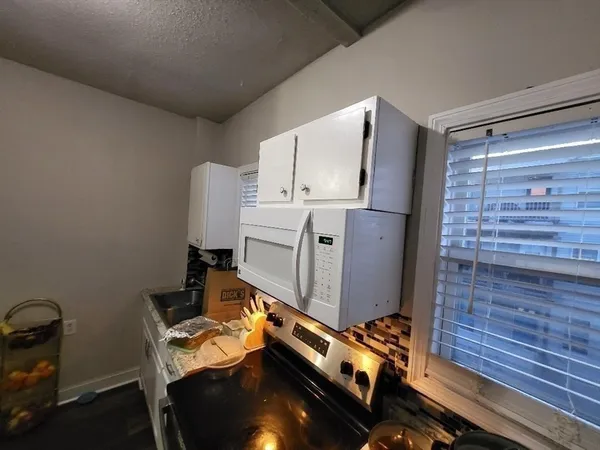 a bathroom with a sink and toilet