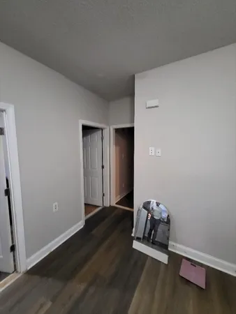a view of a livingroom with furniture and a chandelier