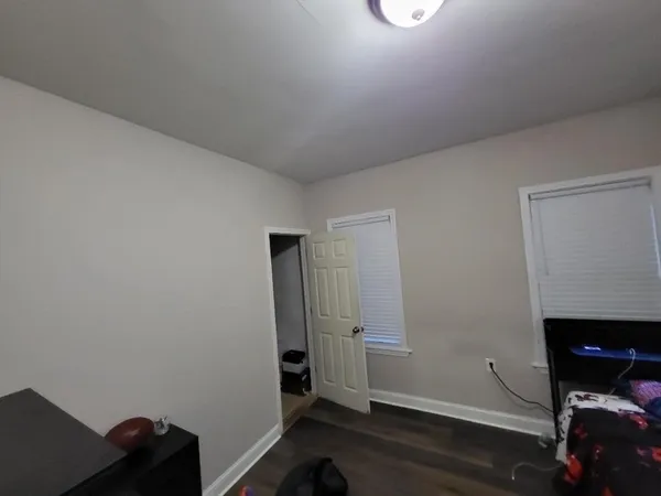 a kitchen with a sink a stove and cabinets